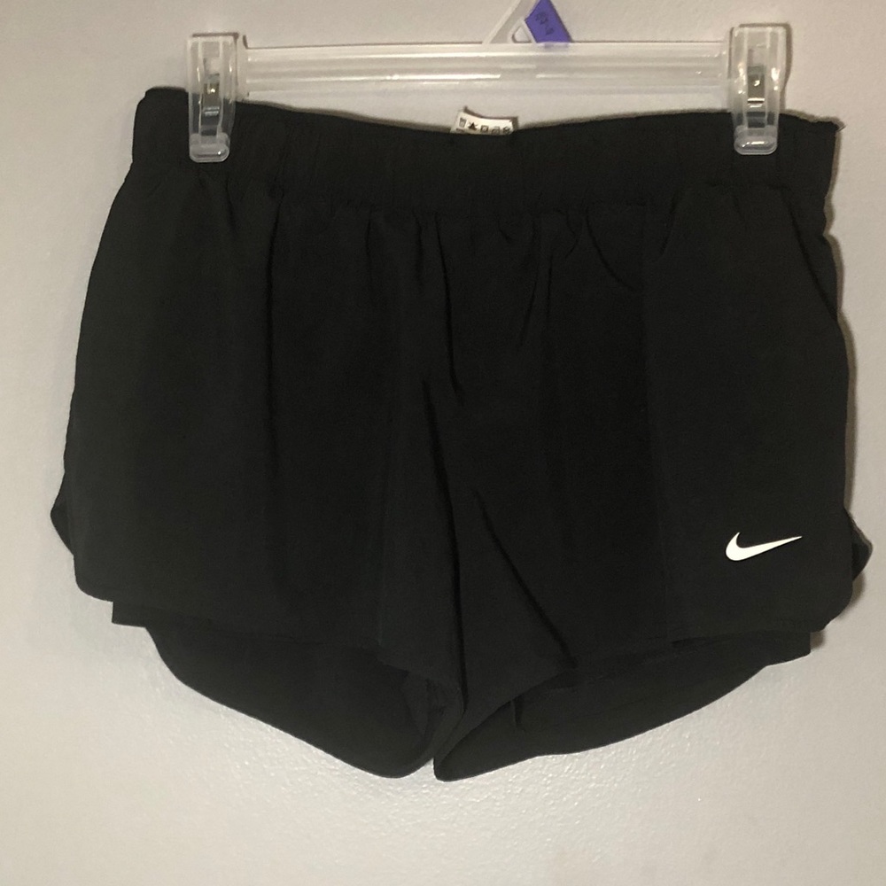 Split Nike running shorts